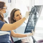 doctor talking with patient