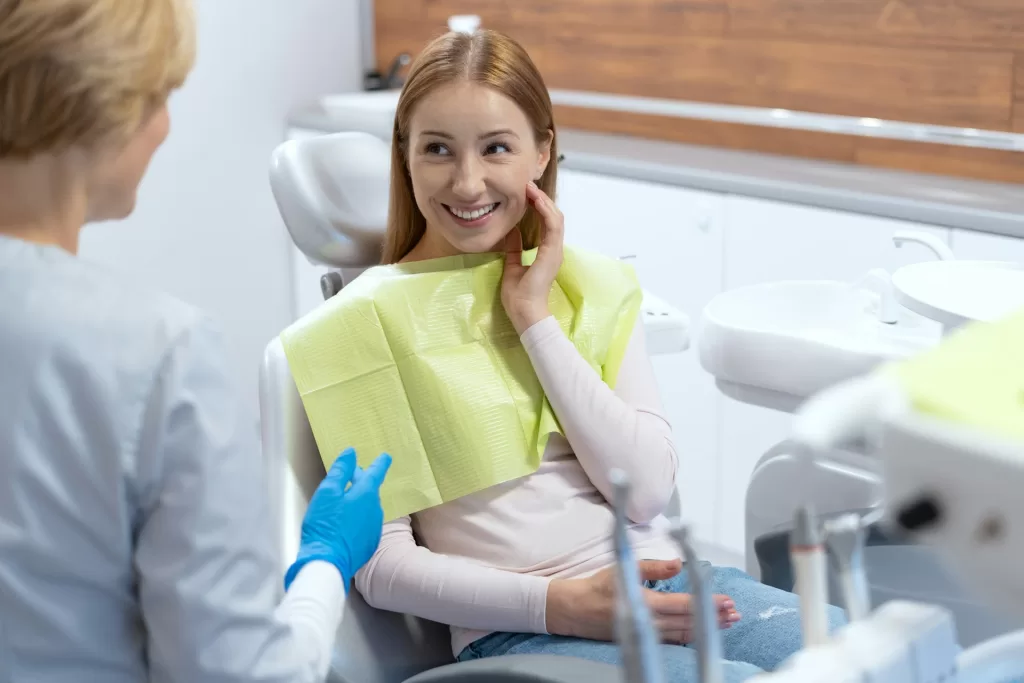 A patient, after a blood clot operation, smiles and is happy with the successful results of the procedure.