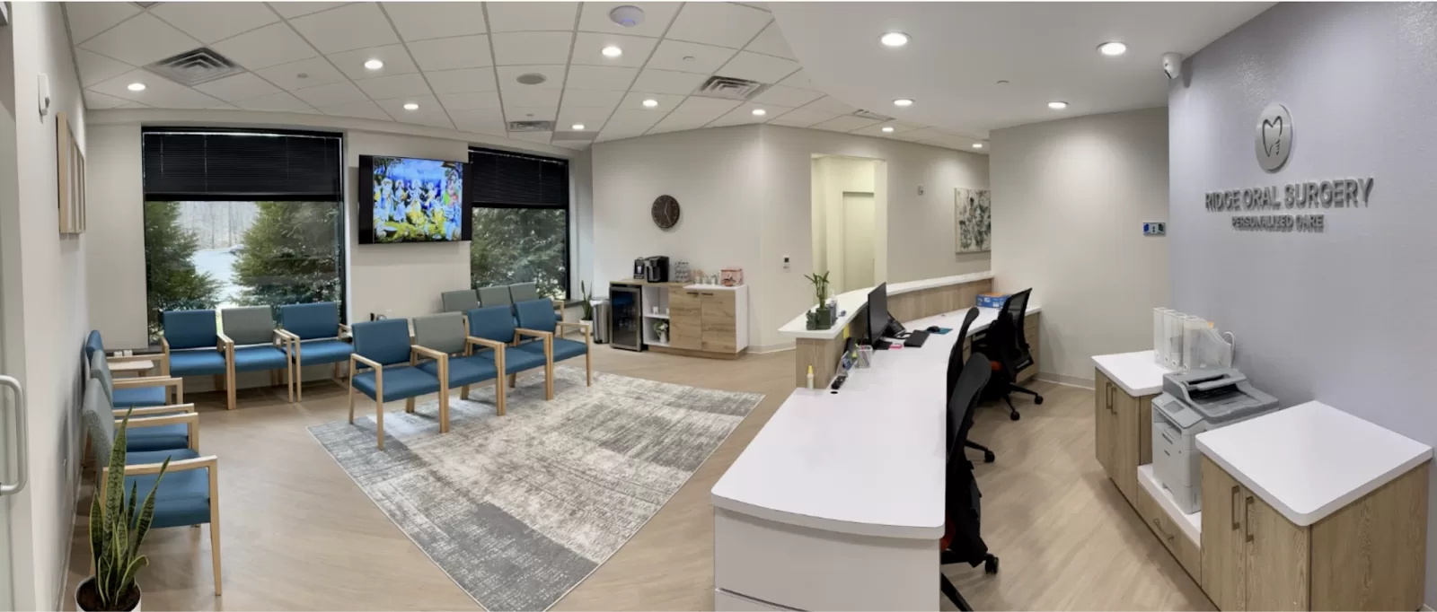 The waiting area at Ridge Oral Surgery offers a comfortable, welcoming space for patients before dental implant procedures.