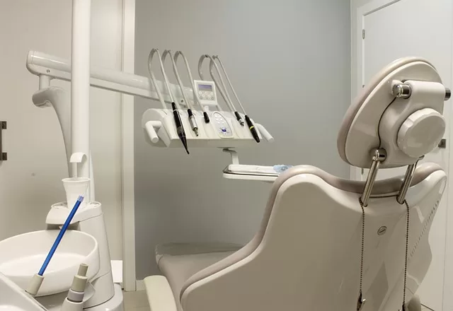 a dentist chair with equipments