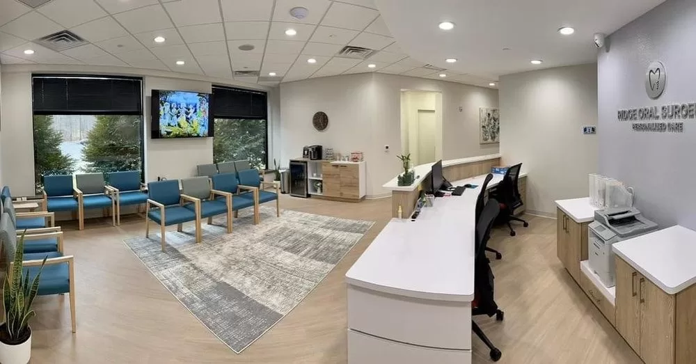 A modern dental clinic reception area with comfortable seating and a welcoming atmosphere, highlighting a focus on gum disease treatment and overall oral health.