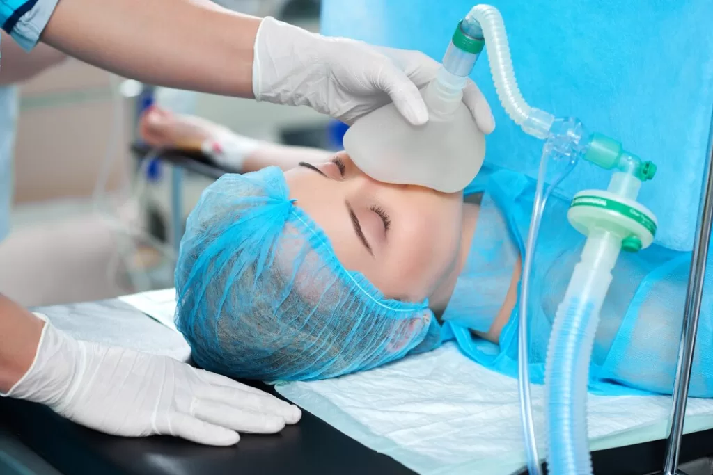 A patient undergoing sedation during oral surgery.