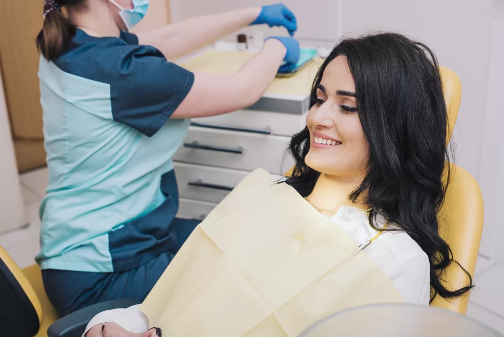 Female patient waiting for the dentist at the Ridge Oral Surgery clinic.