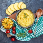 Soft recovery foods including mashed potatoes and scrambled eggs prepared for healing after tooth extraction.
