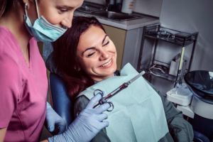 Oral surgery patient receiving comfortable dental treatment at the Ridge Oral Surgery clinic.