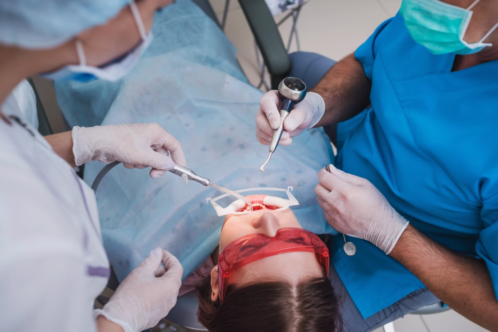 Wisdom teeth removal procedure with oral surgeons in Ridge Oral Surgery Clinic.